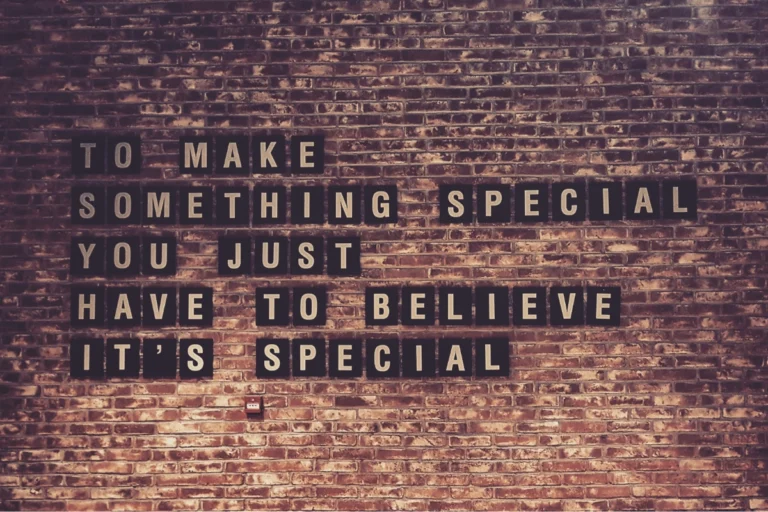 affirmation on a brick wall