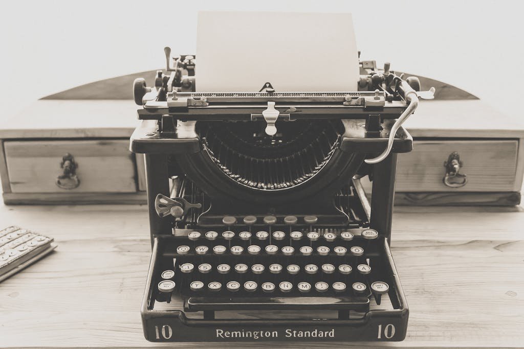 Sepia-toned image of a classic Remington typewriter, perfect for vintage themes.